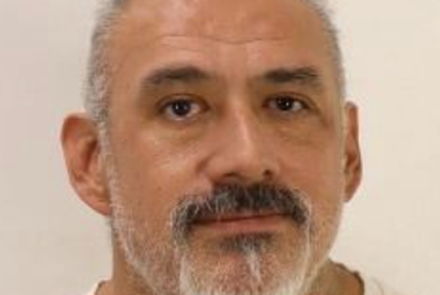 More than 20 years after a man was found shot dead in his car police say they have arrested his suspected killer