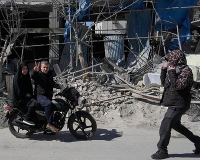 ‘People are gripped by huge fear’: defiance and hope on the streets of Tehran