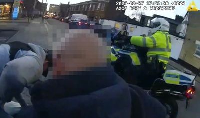Moment teenager, 19, rammed off his moped by Met Police during crackdown on illegal riders