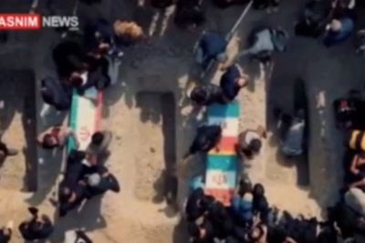 Iran mourns students and staff killed in school strike as thousands attend funerals