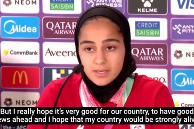Iran women’s football player fights back tears as she says she is ‘concerned and sad’ over conflict