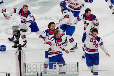 The victory lap for America's Olympic hockey champions quietly shed politics from the celebration