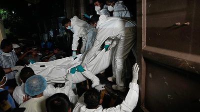 Bodies of Iranian sailors arrive at Sri Lanka mortuary after warship sinking