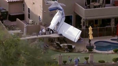Small plane crashes into two homes in Phoenix, three injured