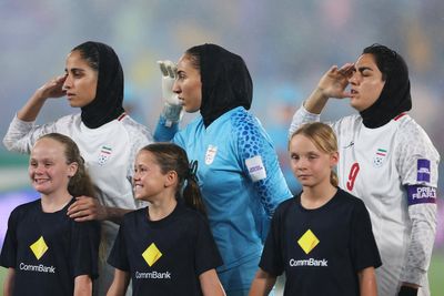 Iran women’s football team sing national anthem at Asian Cup just days after silent protest