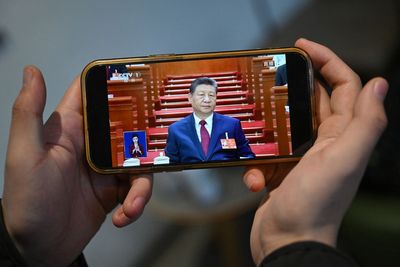 China sets lowest growth target in over 30 years as economy feels strain