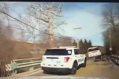 Police SUV flipped after landing on suspect’s flatbed truck in wild car chase