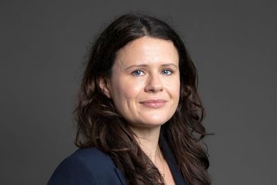 MP suspended after husband arrested on suspicion of spying for China