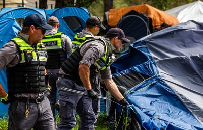 Homeless people camping in Queensland park ‘not treated as humans’ during council evictions, court finds