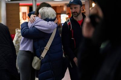 British couple describe sheltering in Dubai car park as first repatriation flight from Middle East lands in London