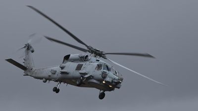 China closes in on Australian helicopter in Yellow Sea