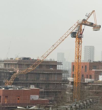 Over 100 evacuated from building site after crane collapses in west London