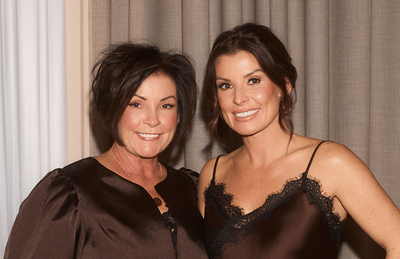 Coleen Rooney parties with her lookalike mum at launch of her Primark collection