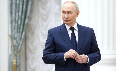 Is 'Real' Vladimir Putin Dead? 'Body Double' Theory Explodes After Awkward Kremlin Photo