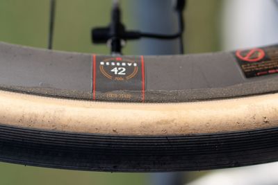 Why are Visma-Lease a Bike glueing their tubeless tyres into place at the Spring Classics?