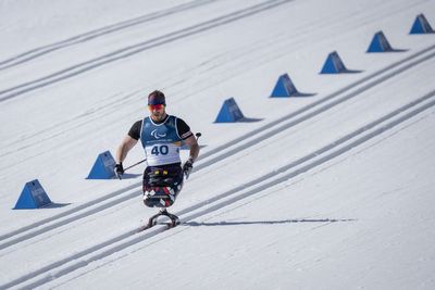 Duke of Sussex hails Paralympic skier’s determination as he takes on biathlon