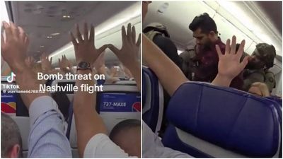 Watch: Video shows passengers raising hands as man is dragged off Southwest flight after security scare