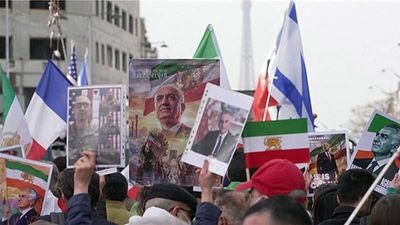 Pro-monarchy and pro-democracy protesters gather across Europe in support of Iran