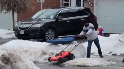 Video of Brampton man clearing snow with lawnmower goes viral: 'Not the best and brightest'