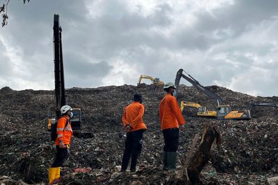 Waste mound collapse at Indonesia's largest landfill kills at least 5 and leaves several missing