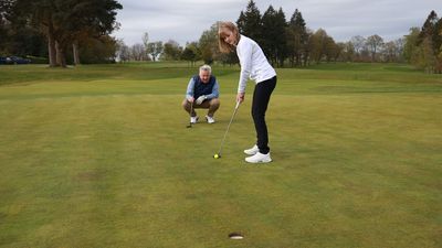 My Opponent In A Match Crouched Down Behind The Line Of My Putt. Is That Allowed?