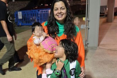 Young mother killed saving six-year-old son from attack by three dogs