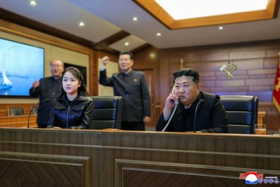 North Korea leader Kim Jong Un watches cruise missile tests with teenage daughter