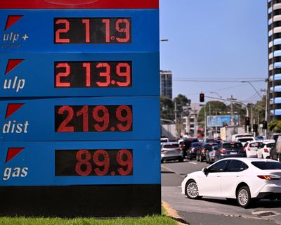 Australians hit by soaring petrol prices now face expected blow of interest rate rise