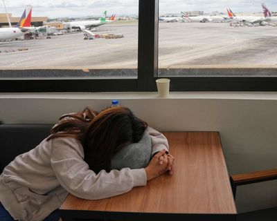 ‘If I go home, we don’t have enough money’: the low-paid Filipino workers caught up in the war on Iran