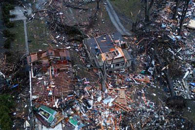 Two killed as tornadoes level homes and businesses in Illinois and Indiana