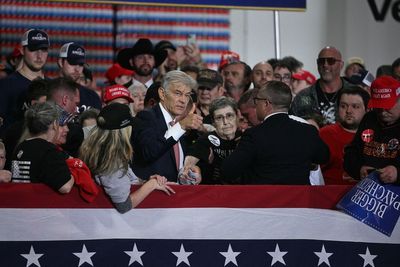 Dr Oz steps in to assist woman who collapsed at Trump rally as president asks staff to play a song while they wait