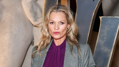 Kate Moss gives grey tailoring a spring makeover with this bold colour pairing at Paris Fashion Week