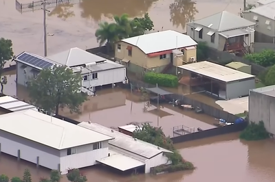 Bodies of Chinese tourists found trapped inside car in Queensland floods