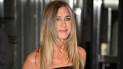 Move Over Black and White – This is the New High-Contrast Color Pairing to Watch, and it Gives Jennifer Aniston's Dark Living Room a Vibrant Twist