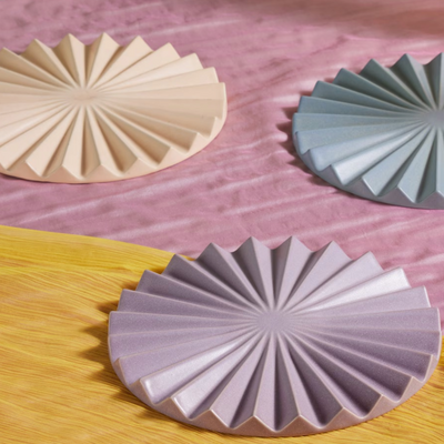 I've been waiting for Our Place's gorgeous pleated trivets to drop in the UK – and IKEA just launched a lookalike £4 version at the exact same time