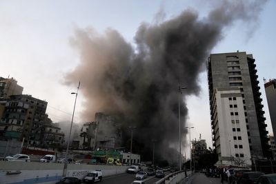 Photos of a central Beirut district struck by Israeli bombs