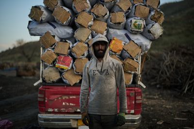 Photos: Charcoal workers in a quiet Kurdish village carry on as war unfolds