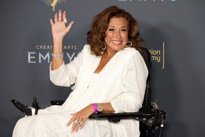 Hilarious moment Abby Lee Miller’s wig flies off on roller coaster