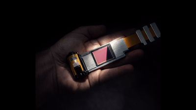 I’m obsessed with retro cameras. This gadget looks like a roll of film, but it's actually an APS-C sensor that allows old cameras to shoot digital – and even 4K video!