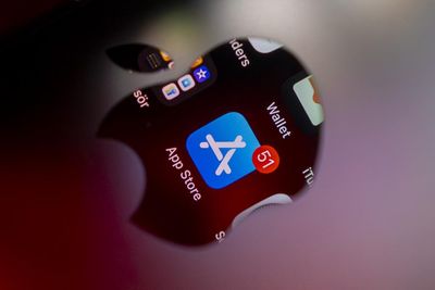 Apple cuts China App Store commission fees after government pressure
