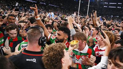 Arrests, charges amid pitch invasion for NRL hero