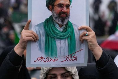 US bombs military sites on Iranian island as Trump threatens its oil infrastructure