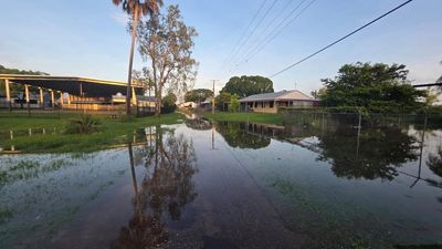 Homes flooded to rooftops as emergency relief arrives