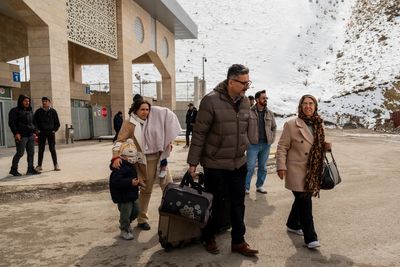 Iranians grapple with whether to flee the country because of the war