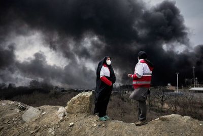 After attacks on Iran's oil facilities, toxic black rain endangers the public