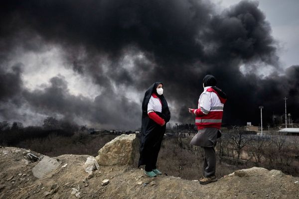After attacks on Iran's oil facilities, toxic black rain endangers the public