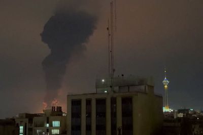 ‘Black rain’ falls in Iran as toxic smoke billows from bombed oil depots