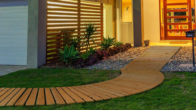 I've Found a Stylish, Low-Effort, and Low-Cost Way to Create an Instant Garden Path, Without Calling the Landscape Designers — This Roll Out Wooden Walkway Is a Game Changer