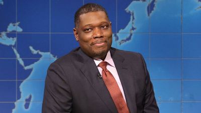 Bet You Can Guess Who Michael Che’s SNL Joke About A 'Husband-Carrying Contest' Was About