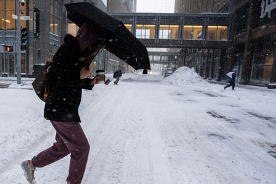 Powerful storms make their way across US bringing everything from tornados to snow